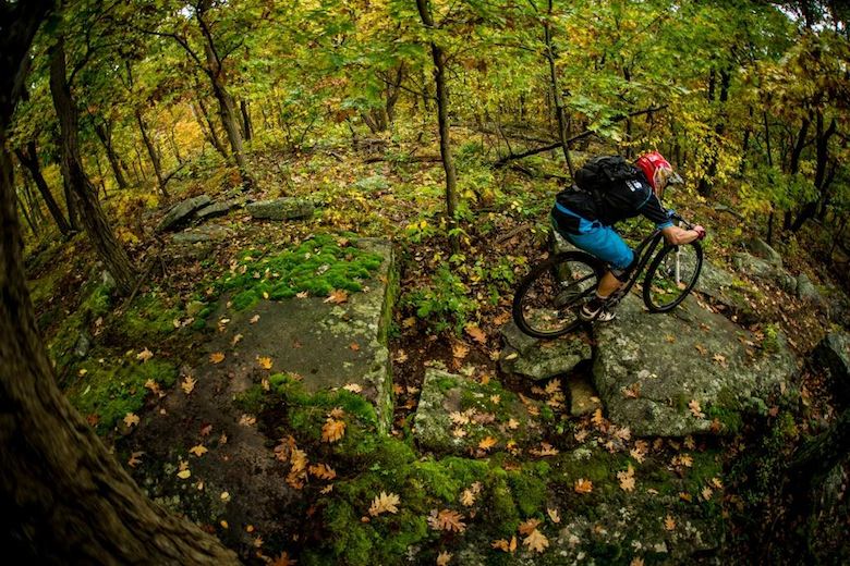 One thing Mountain Creek Bike Park has no shortage of is square edged rock. Here a racer finds the line through a new section of woods.