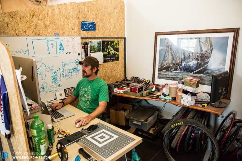 Todd Bischoff’s workspace spills over with tires, wheels, cranks, bearings, tools, and a sick large print of some crazy fishing boat. Constantly working and creating doesn’t leave a ton of time for cleaning up. 