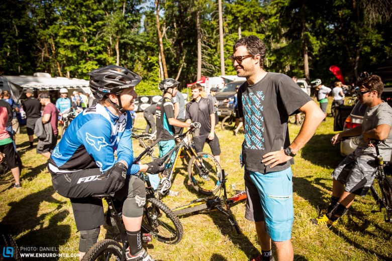 Eduardo de Solminihac, part of the organizing team at Montenbaik, behind Andes Pacifico and Enduro World Series Nevados de Chillan, Chile chats with Josh Carlson, who is returning from injury. 