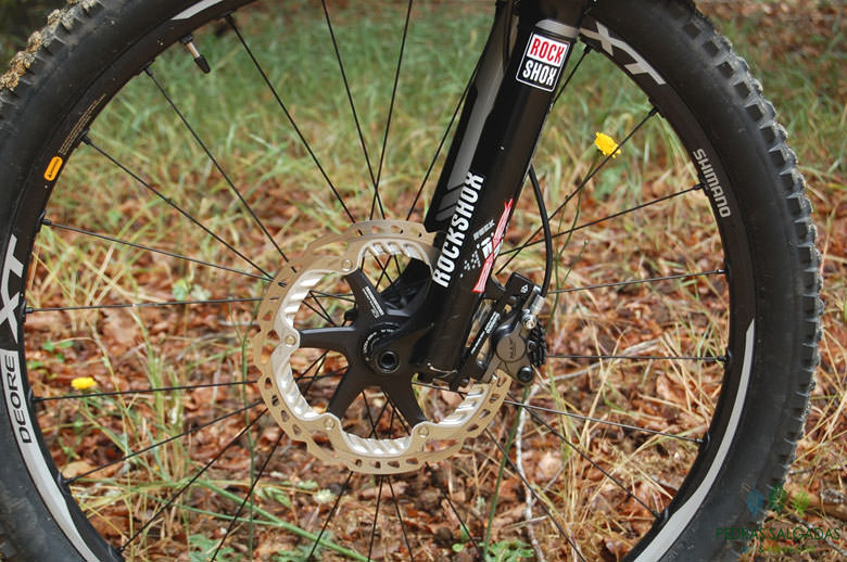 The RockShox pike in front and a Shimano XTR Trail brake.