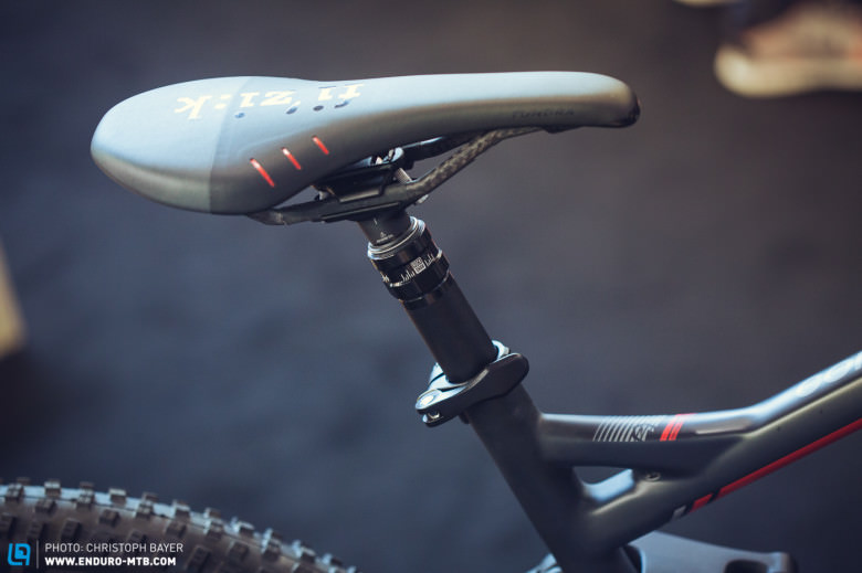 The saddle is always in position, because of the seat post. 