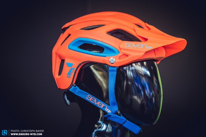 The SEVEN M2 helmet in bright orange.