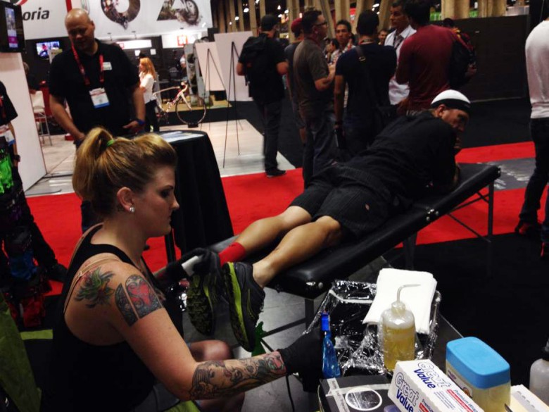 If you really wanted it, Swiftwick was paying a tattoo artist to place a permanent show of your love for Swiftwick on your body. In the booth, at Interbike. 