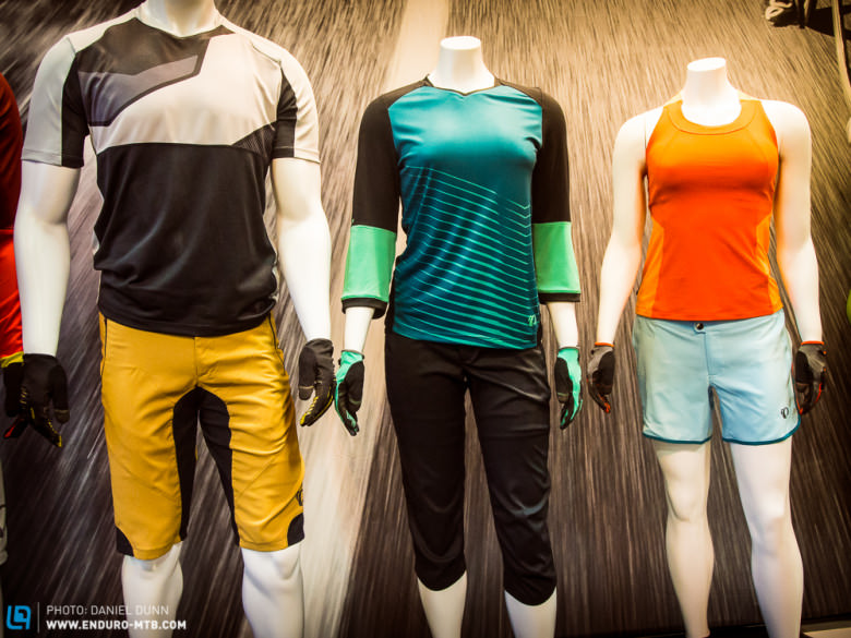Mix of men and women's mountain bike clothing from Pearl Izumi has colors and looks that could be very popular in 2015. 