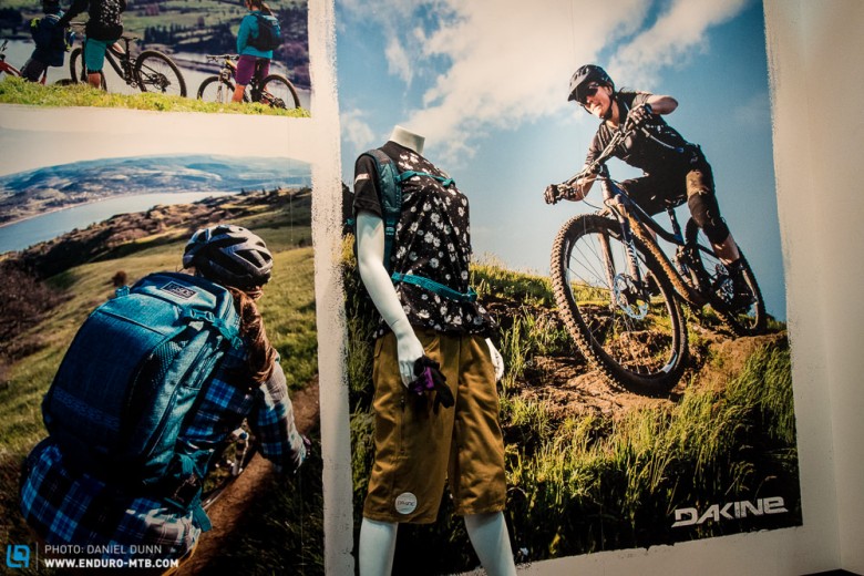 Dakine is completely on board with women's clothing, and feature girls prominently in their point of sale marketing. 