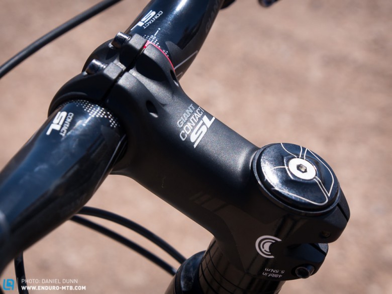 Giant branded stem and bar control the cockpit. 