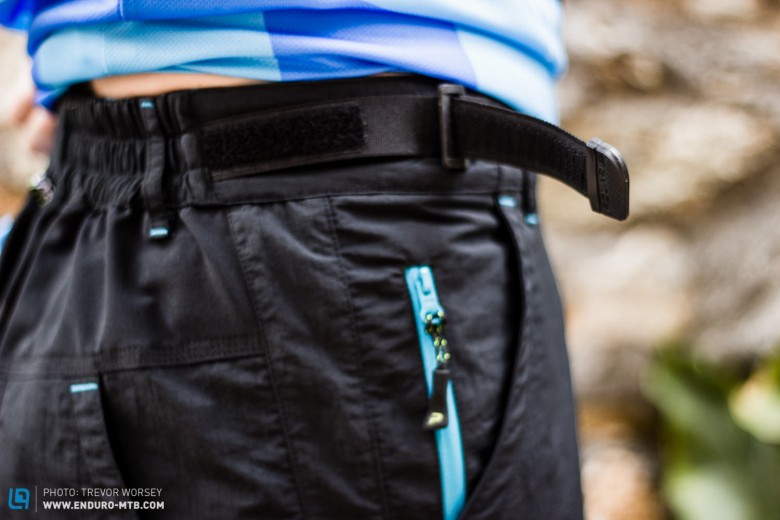 The shorts have a zip fastening security pocket, with two hip pockets front and back