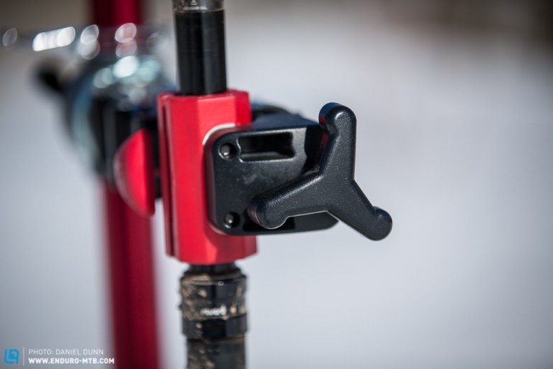 After pushing together the clamp around seatpost, tighten here to hold securely. 