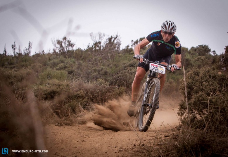 A riders gets loose during the Prologue of the 2014 Absa Cape Epic Mountain Bike stage race held at Meerendal Wine Estate in Durbanville outside Cape Town, South Africa.