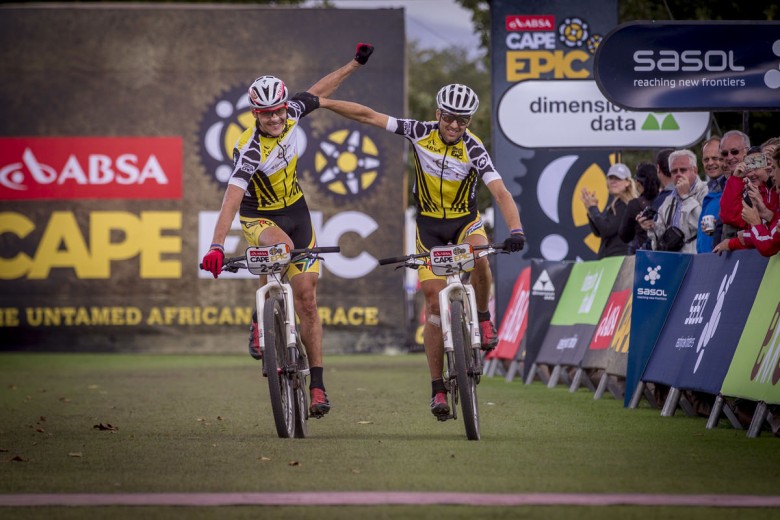 Jaroslav Kulhavy and Christoph Sauser (Investec Songo Specialized) taking their second win on the second stage of the Absa Cape Epic 2015. 