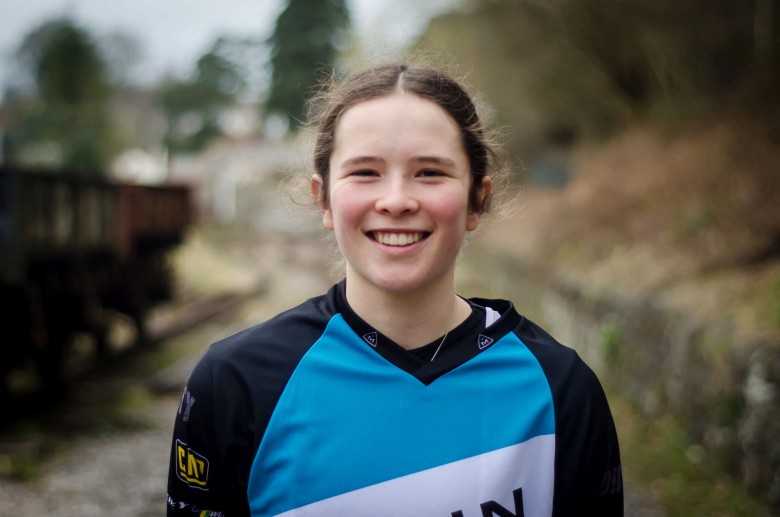 18 year-old, Martha Gill. It does say she's 17 in the video, but according to the enduroworldseries website, she's 18. Make your mind up, Martha