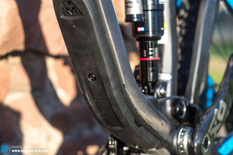 Take off the replaceable down-tube protector and there's a handy slot to access internal cable routing.
