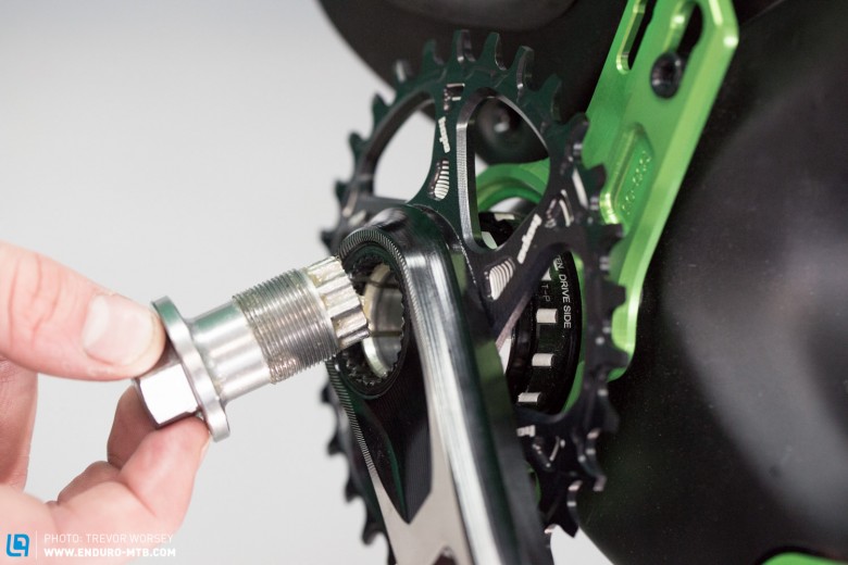 By hand, screw in the supplied crankset assembly tool 
