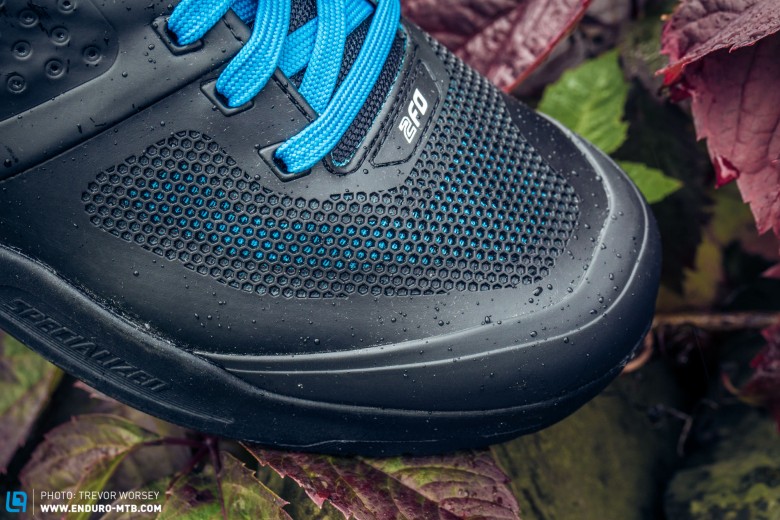 The shoes feature an injection moulded toe box, for protection from rock strikes