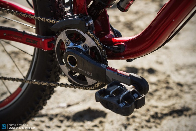 The drive train is fully kited out in SRAM XX1 with an E*13 TRS+ guide for extra security.  Note the cable tie over the clamp to stop it popping open on rough terrain. 