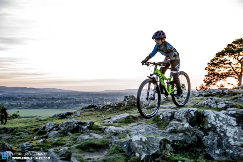 Downhills bring out the lad's confidence, this mini enduro bike eats up the rocks.
