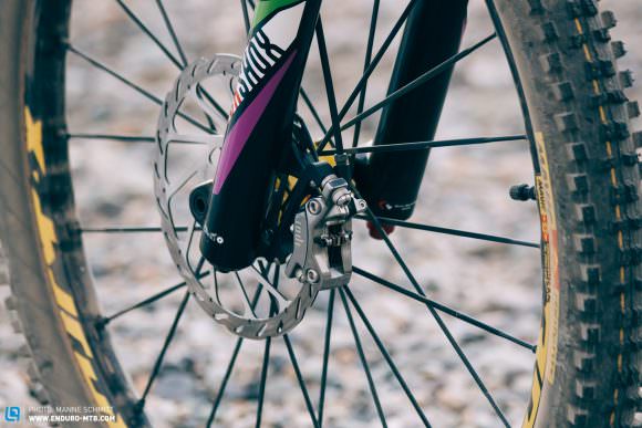 When it comes to tires, Sam runs a Mavic Charge PRO XL 2.4 on the front and back, inflated to 23 psi and 28 psi respectively. He choses the burly Mavic Deemax Pro rims for maximum cornering aggression.